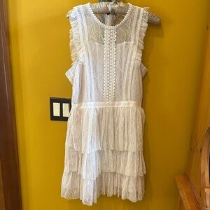 White Lace Layered Chelsea and Violet lace dress with poly lining.